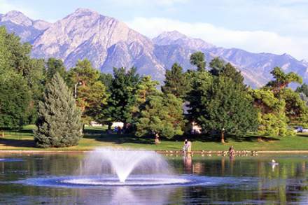 Lake at Liberty Park with view of mountains