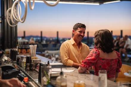 Image of a couple at Van Ryder's rooftop bar