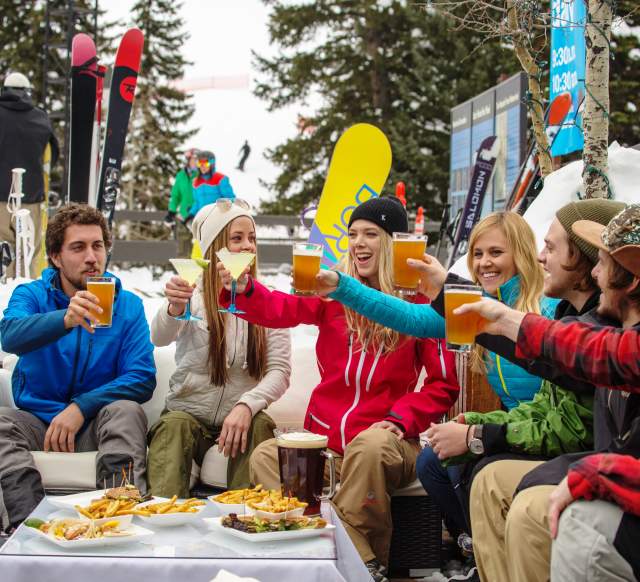 Friends Drinking at Snowbird Tram Deck after Skiing