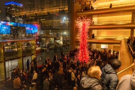 Abravanel hall’s angular exterior opens into a grand gold and white oak lobby.