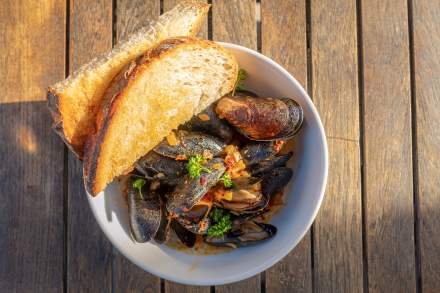 Mussels in bowl with bread from Copper Common