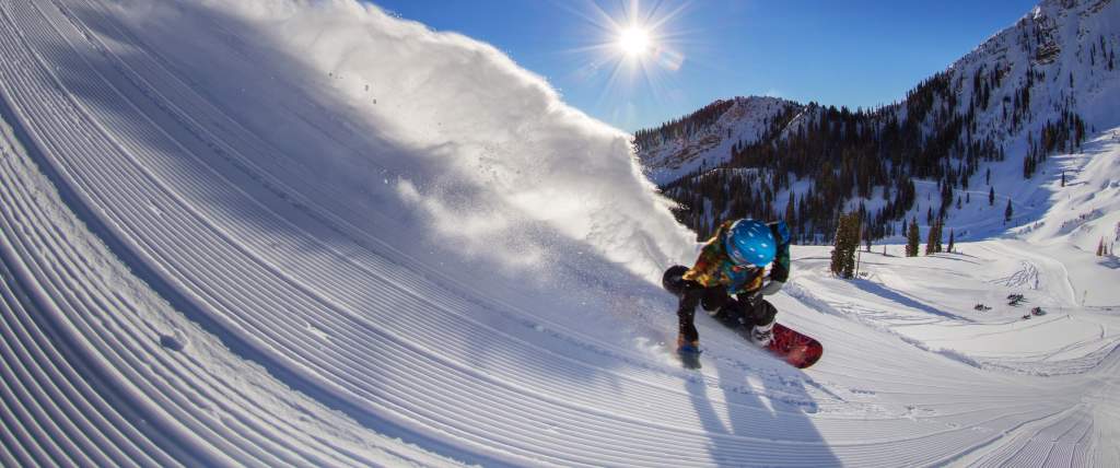 Snowboarder Powder Carving Groomer at Mineral Basin at Snowbird