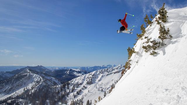 Skier Catching Air at Mineral Basin at Snowbird