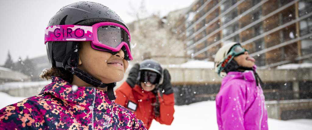 Kids taking snowboarding lessons at Snowbird's Mountain School