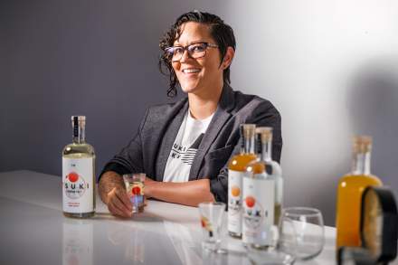Jillian Watanabe poses with her Tsuki Sake products.