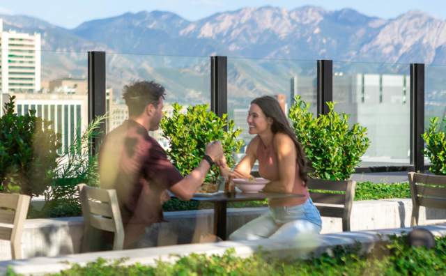 Couple eating at Mar Muntanya in SLC.