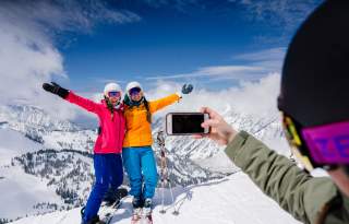 Friends at Snowbird taking a ski photo