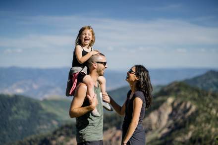 Family of three hiking in the Wasatch Mountains