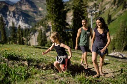 Image of a family of three hiking in the Wasatch Mountains.