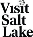 Visit Salt Lake text with a crystal for the dot of the second i in Visit